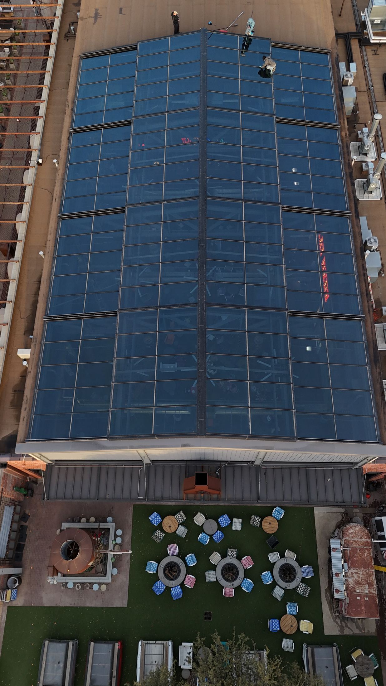 Large glass atrium roof cleaned by Blu's