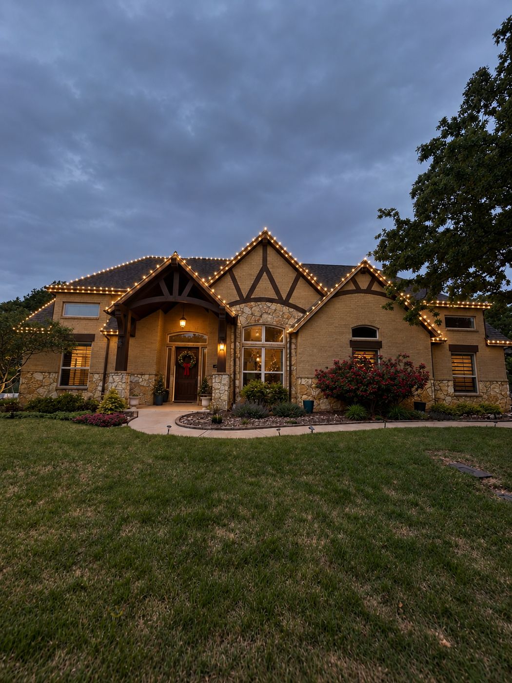Warm white Christmas lights on a Fort Worth home roofline